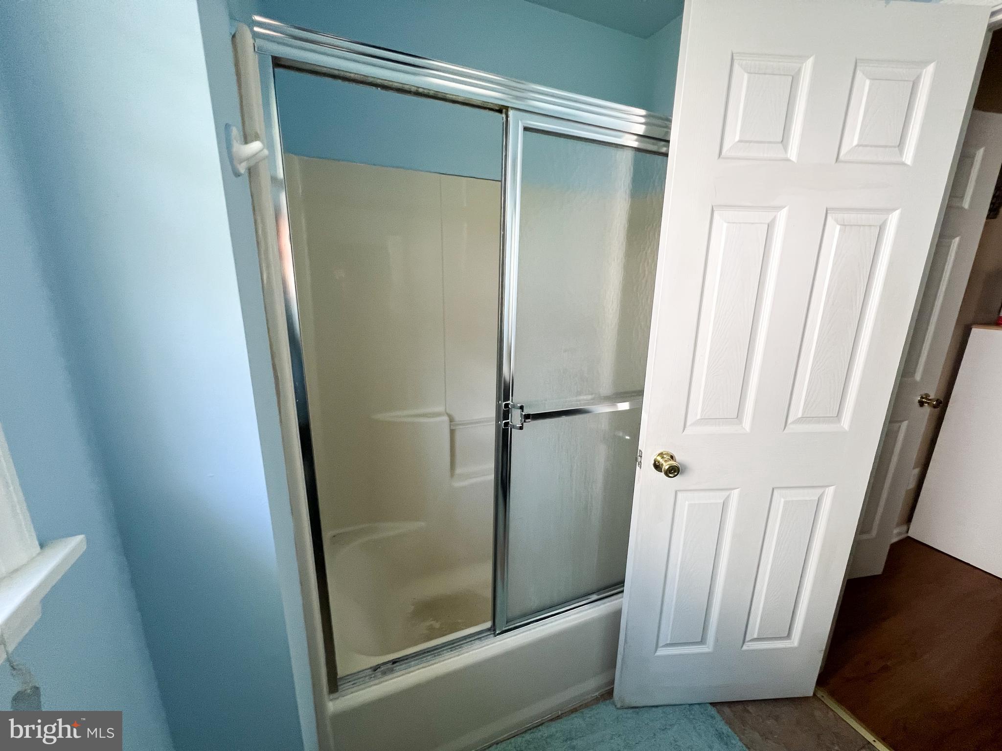214 Mt Vernon Drive Bear, DE 19701 - Photo 16 of 44 a bathroom with a glass door door