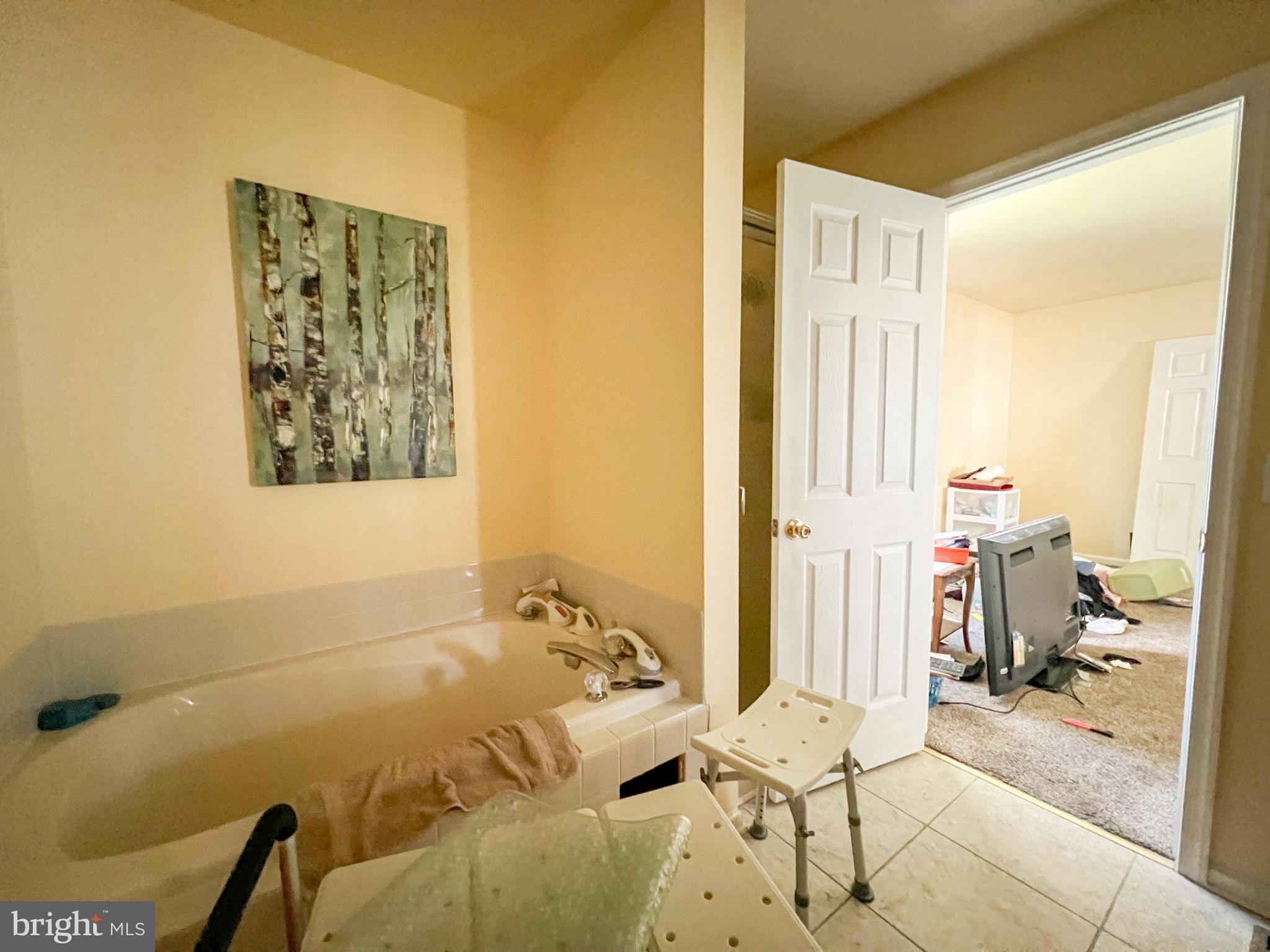 214 Mt Vernon Drive Bear, DE 19701 - Photo 25 of 44 a view of a bedroom with wooden floor and windows
