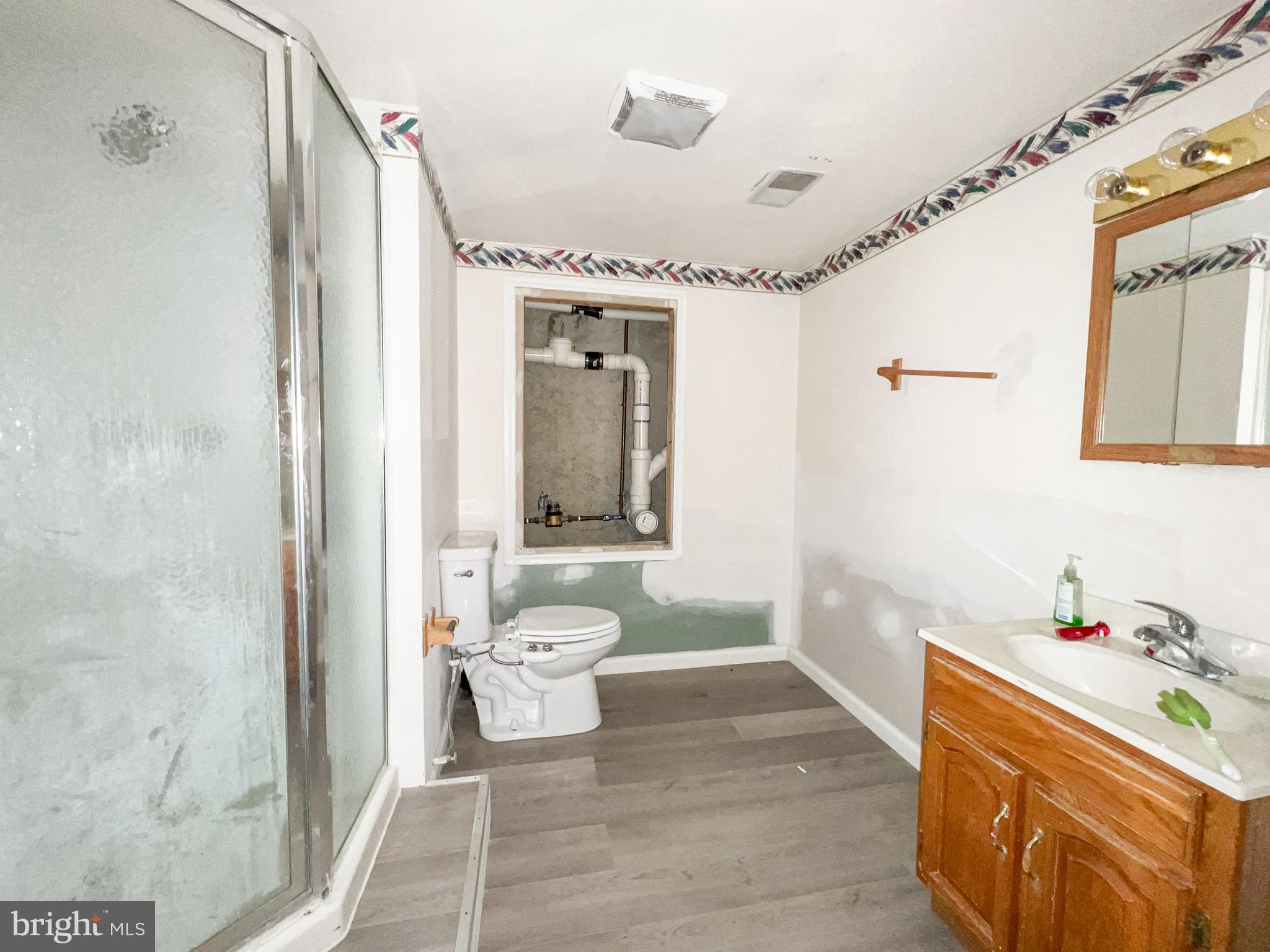 214 Mt Vernon Drive Bear, DE 19701 - Photo 32 of 44 a bathroom with a sink toilet and shower