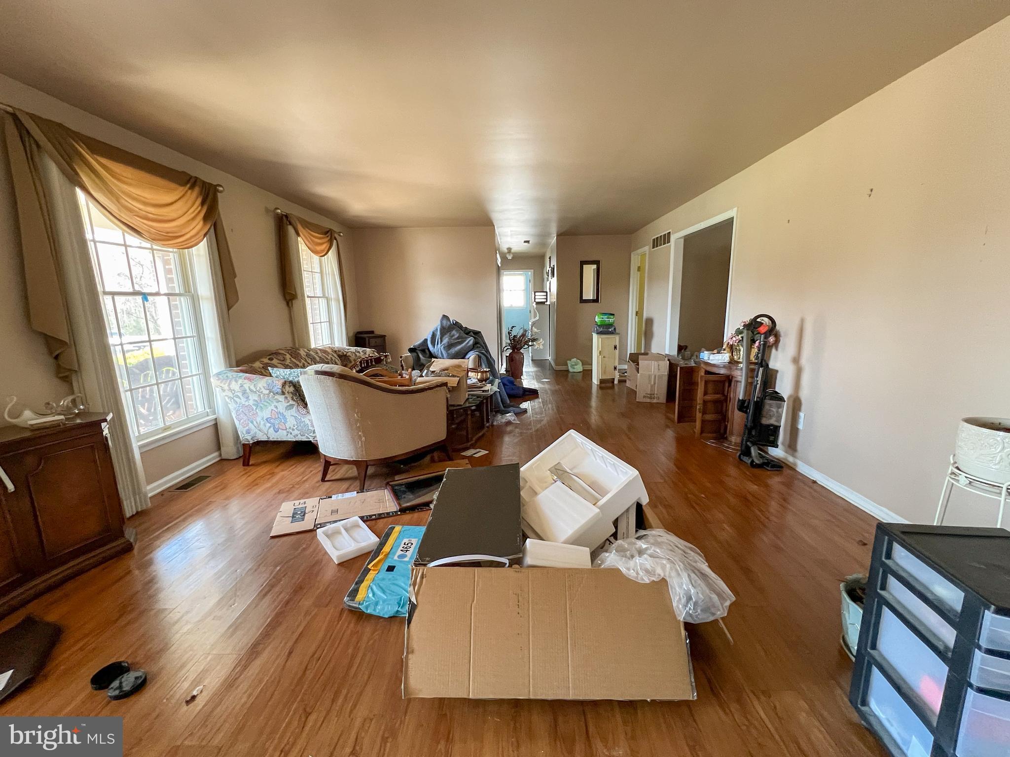 214 Mt Vernon Drive Bear, DE 19701 - Photo 6 of 44 a living room with furniture and wooden floor