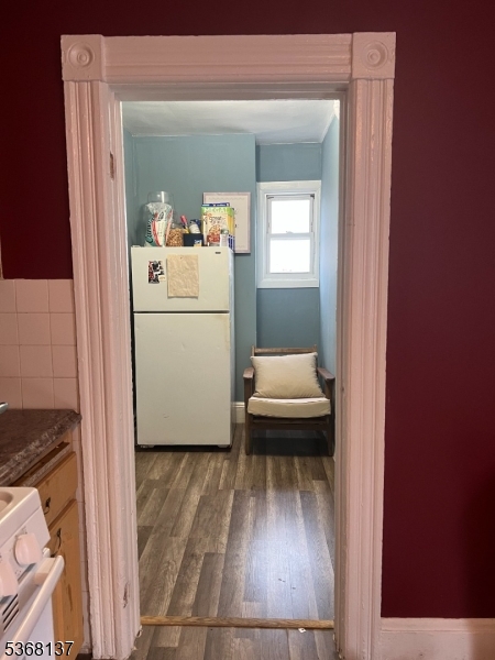 21 Chadwick Street Paterson, NJ 07503 - Photo 14 of 14 a bathroom with a toilet and a mirror