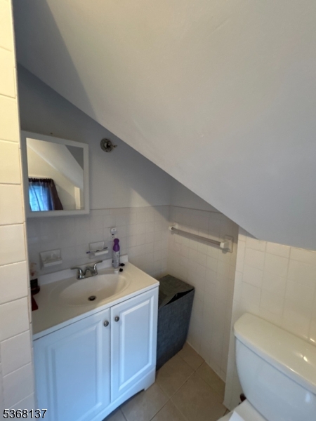 21 Chadwick Street Paterson, NJ 07503 - Photo 9 of 14 a utility room with a sink dryer and washer