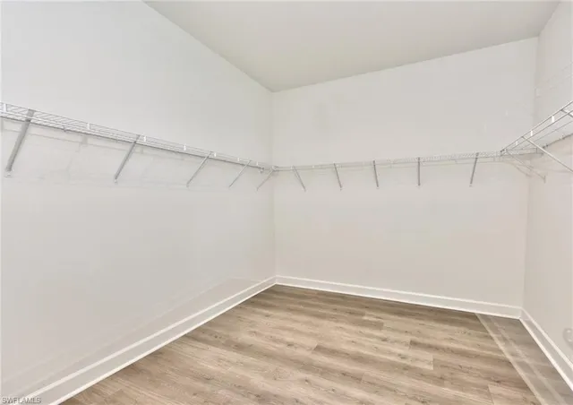 a view of a room with racks on the wall