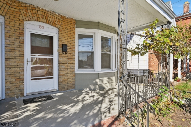 55 Thompson Street Raritan, NJ 08869 - Photo 2 of 23 a view of a house with a tree