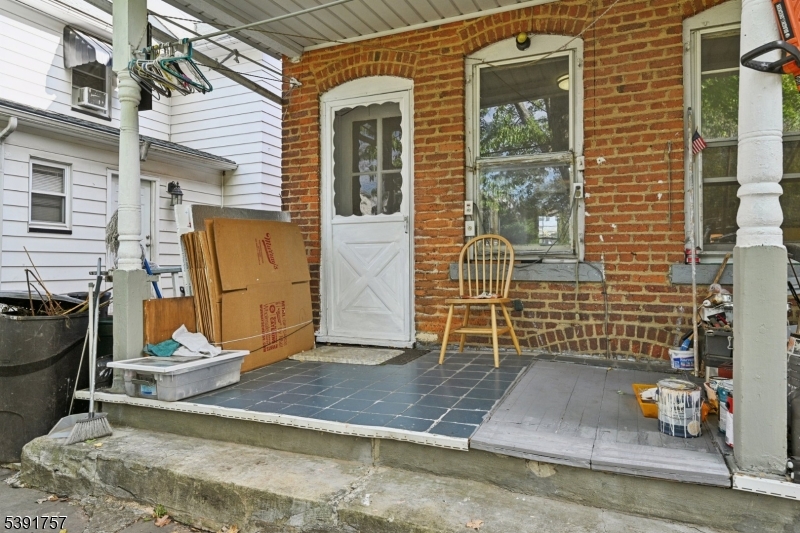 55 Thompson Street Raritan, NJ 08869 - Photo 22 of 23 a view of a house with a door and a window
