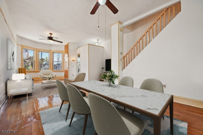 55 Thompson Street Raritan, NJ 08869 - Photo 7 of 23 a view of a dining room with furniture window and wooden floor