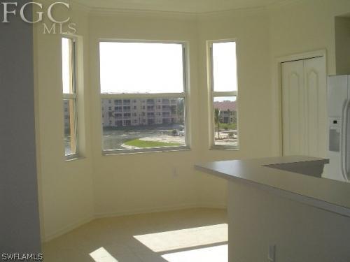 8570 Kingbird Loop, Unit 537 Estero, FL 33967 - Photo 3 of 8 a view of an empty room with a window