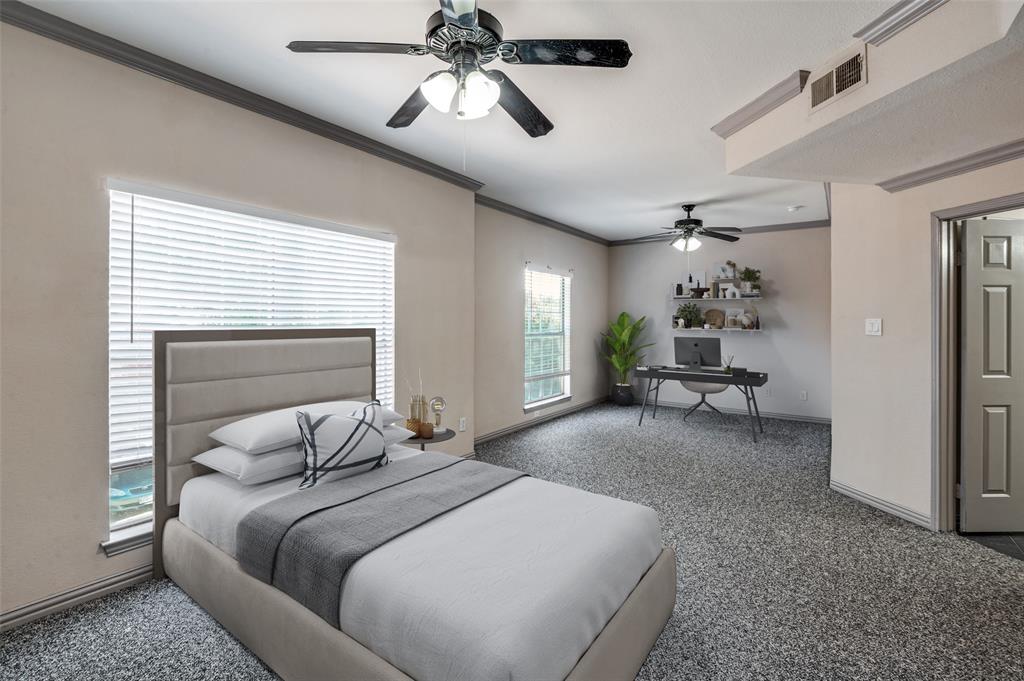 2524 Preston Road, Unit 1404 Plano, TX 75093 - Photo 8 of 15 a bedroom with a large bed and a chandelier