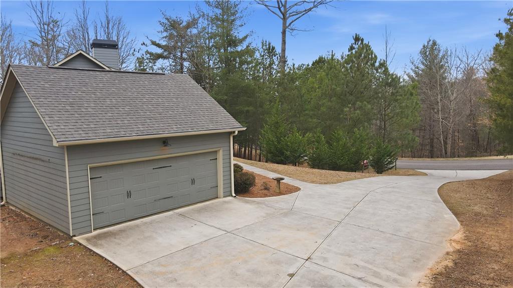 294 Town Creek Road Talking Rock, GA 30175 - Photo 4 of 68 a view of a house with backyard and trees in the background