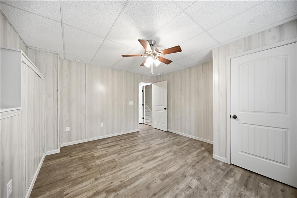294 Town Creek Road Talking Rock, GA 30175 - Photo 43 of 68 wooden floor in an empty room