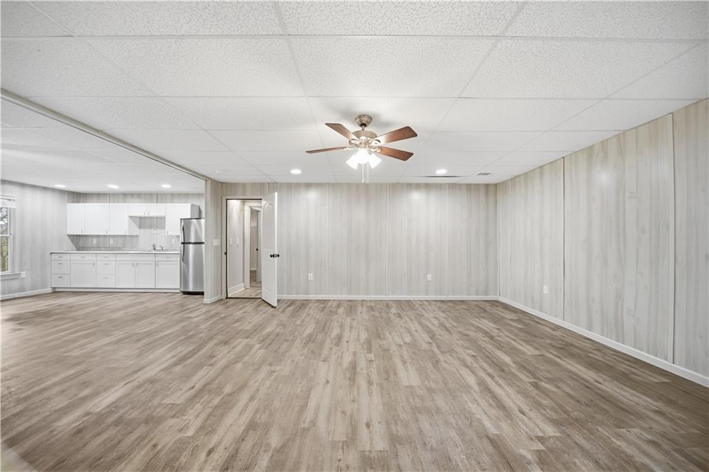 294 Town Creek Road Talking Rock, GA 30175 - Photo 51 of 68 wooden floor in an empty room with a window