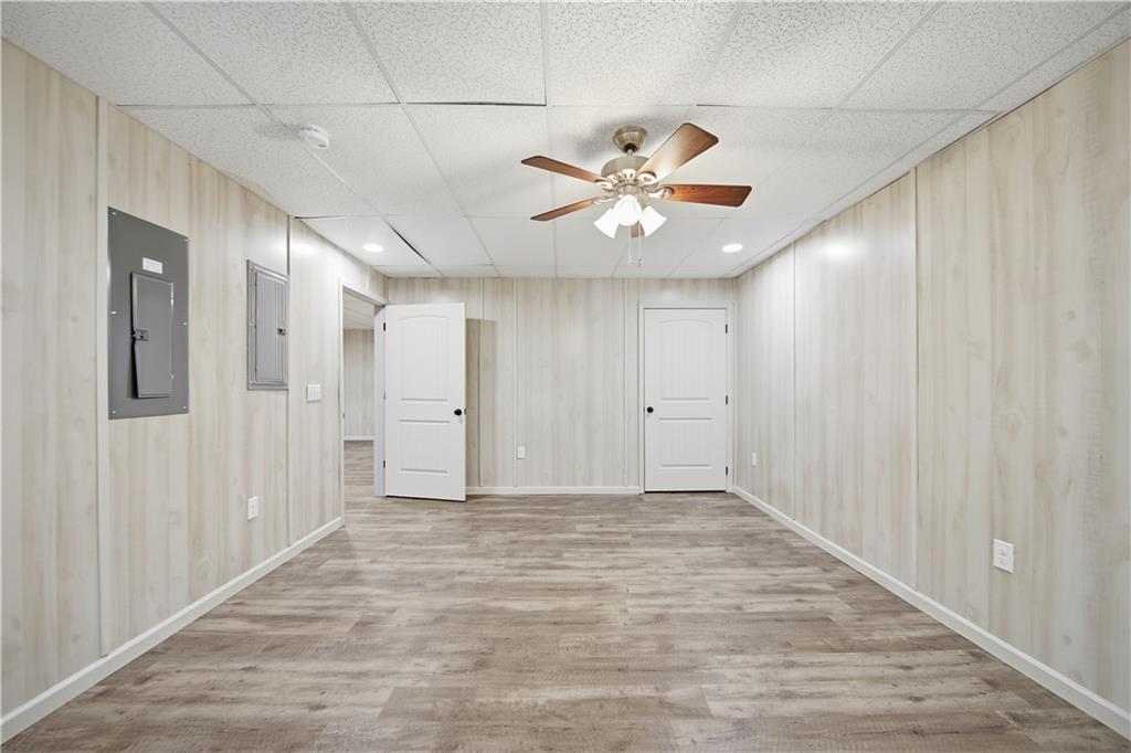 294 Town Creek Road Talking Rock, GA 30175 - Photo 56 of 68 wooden floor in an empty room with a window