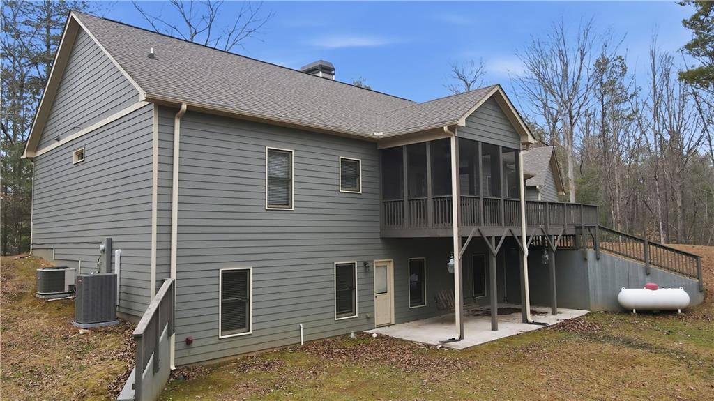 294 Town Creek Road Talking Rock, GA 30175 - Photo 61 of 68 a front view of a house with a garage