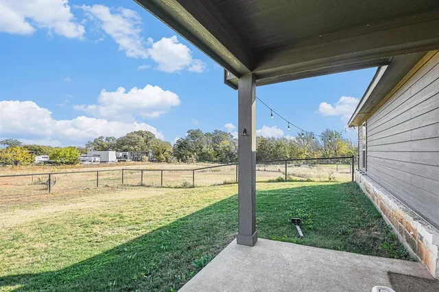 a view of a lake with a big yard