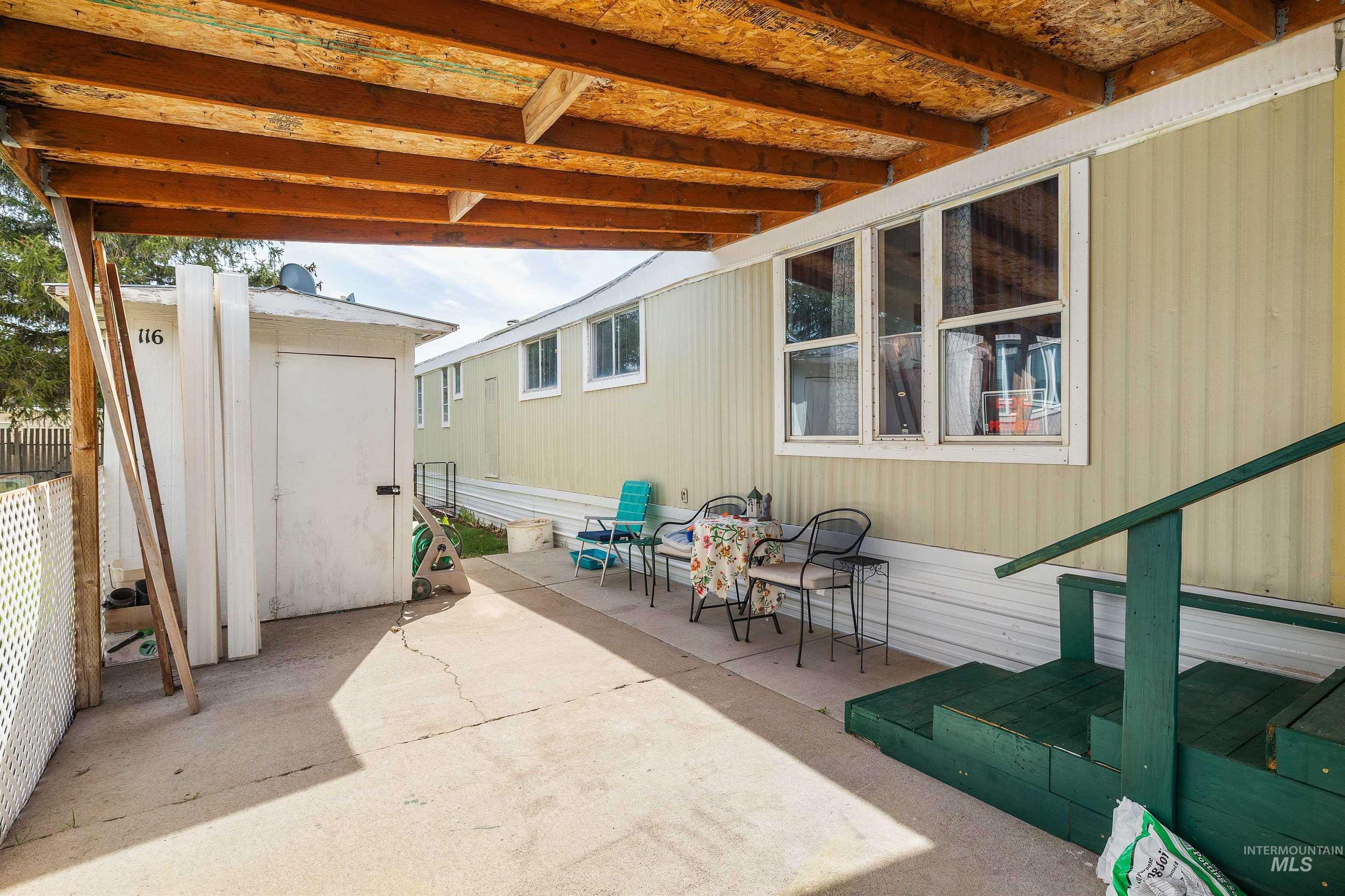 198 South Hills Road, Unit 116 Twin Falls, ID 83301 - Photo 18 of 21 View of patio with a storage unit