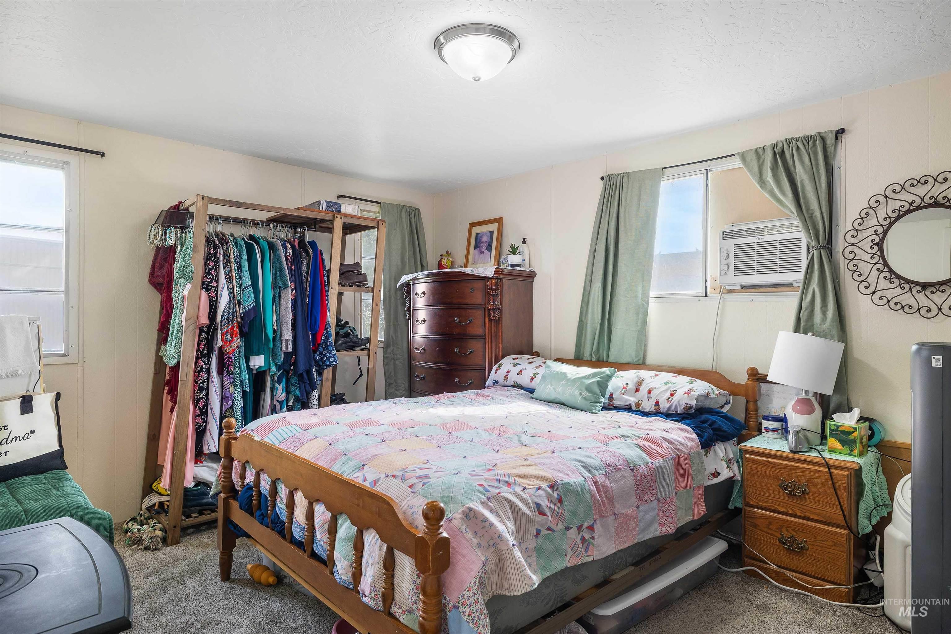 198 South Hills Road, Unit 116 Twin Falls, ID 83301 - Photo 9 of 21 Bedroom featuring carpet flooring