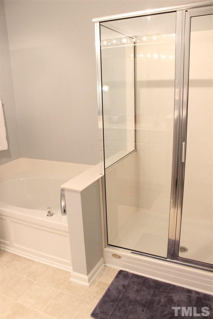 10306 Dapping Drive Raleigh, NC 27614 - Photo 16 of 25 Oversized Master Bathroom. Soaking Tub and separate shower!
