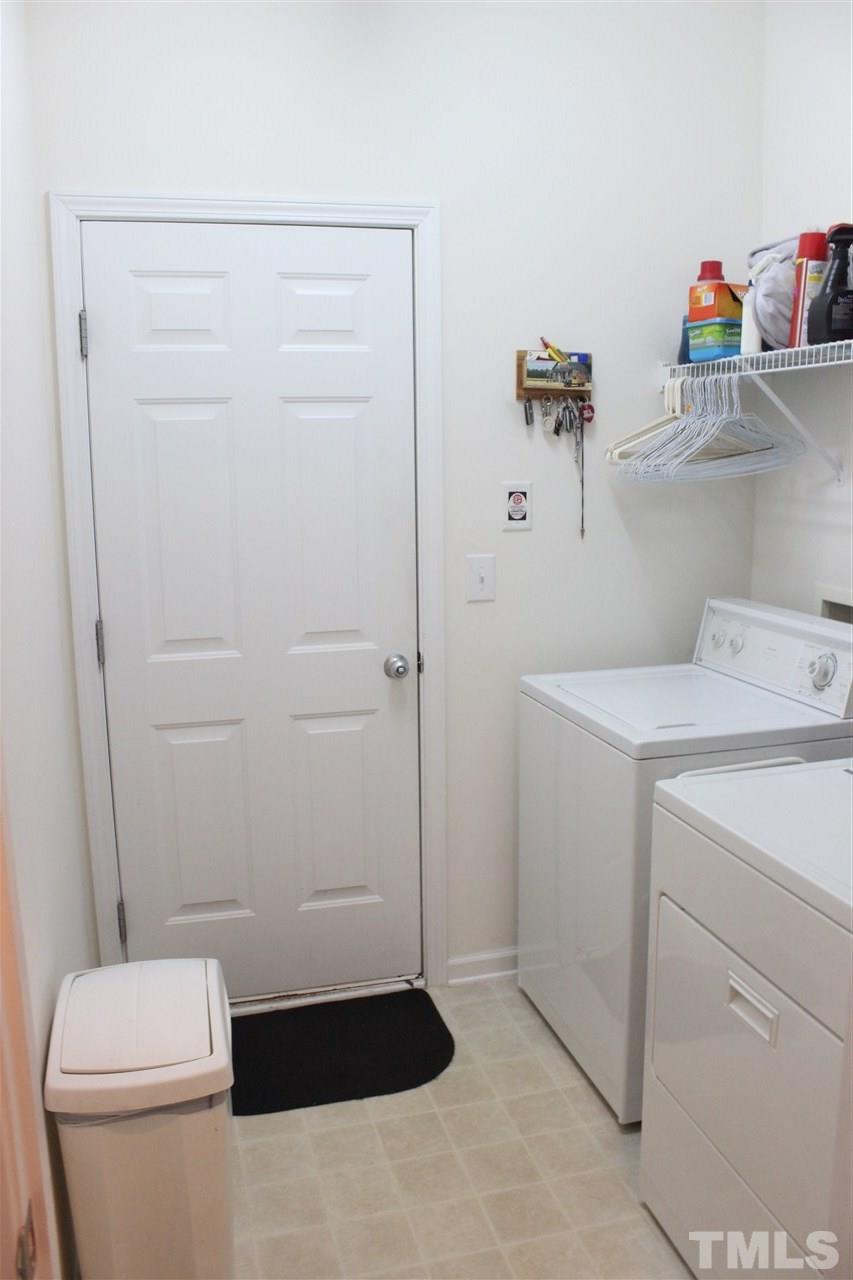 10306 Dapping Drive Raleigh, NC 27614 - Photo 20 of 25 Laundry just off two car garage