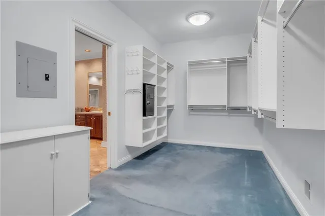 a view of a storage & utility room with two washing machine