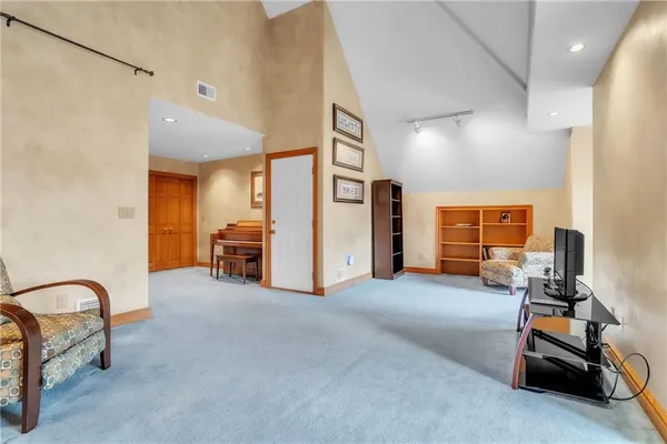 a view of a livingroom with furniture and a furniture