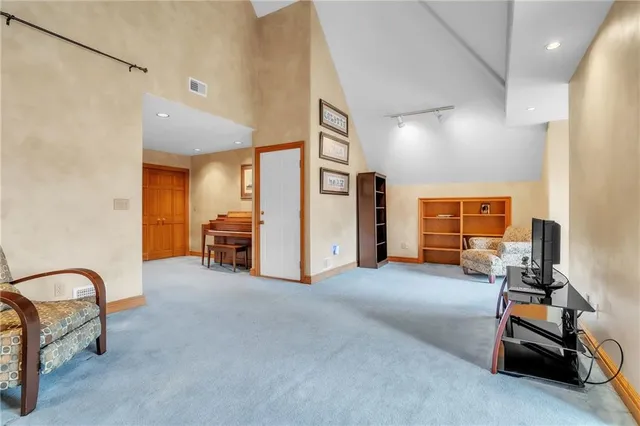 a view of a livingroom with furniture and a furniture