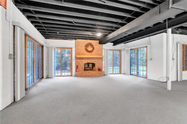 a view of empty room with windows