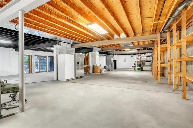 a view of a room with wooden roof