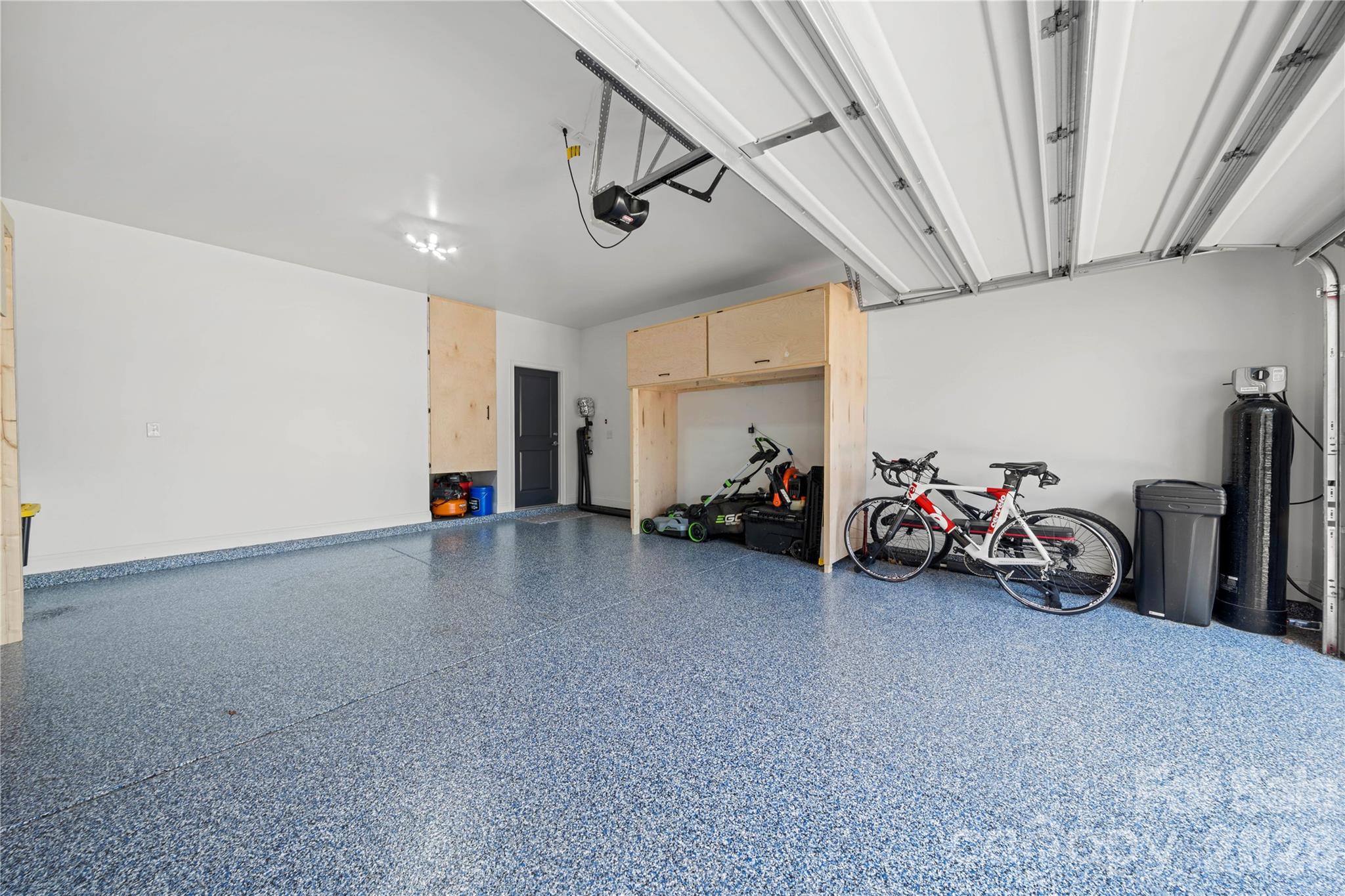 11266 Trailside Road Concord, NC 28027 - Photo 44 of 48 a view of a garage with parked cars