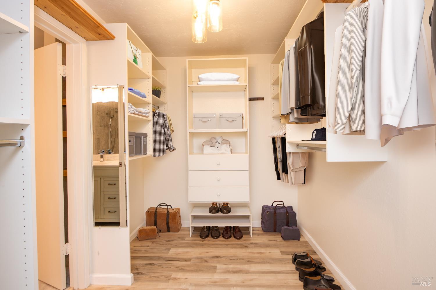 50 Vía Belardo, Unit 12 Greenbrae, CA 94904 - Photo 4 of 13 a bathroom with a sink and a mirror