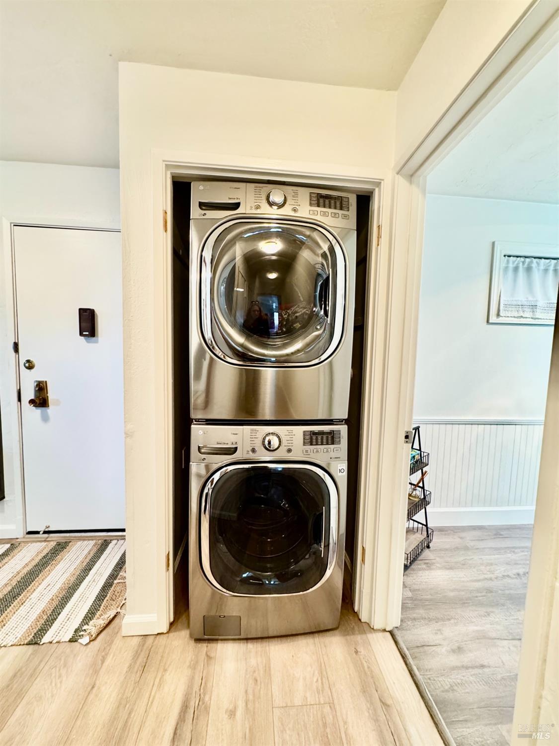 50 Vía Belardo, Unit 12 Greenbrae, CA 94904 - Photo 7 of 13 a utility room with dryer and washer