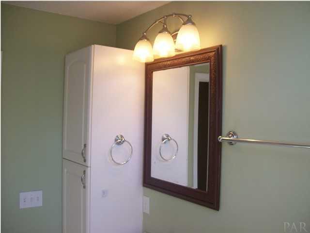 3521 Bauer Road Pensacola, FL 32506 - Photo 21 of 25 Storage cabinet in bath.