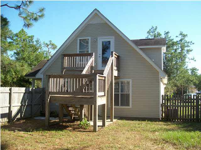 3521 Bauer Road Pensacola, FL 32506 - Photo 23 of 25 View of the deck area from the fenced-in area of the side yard.