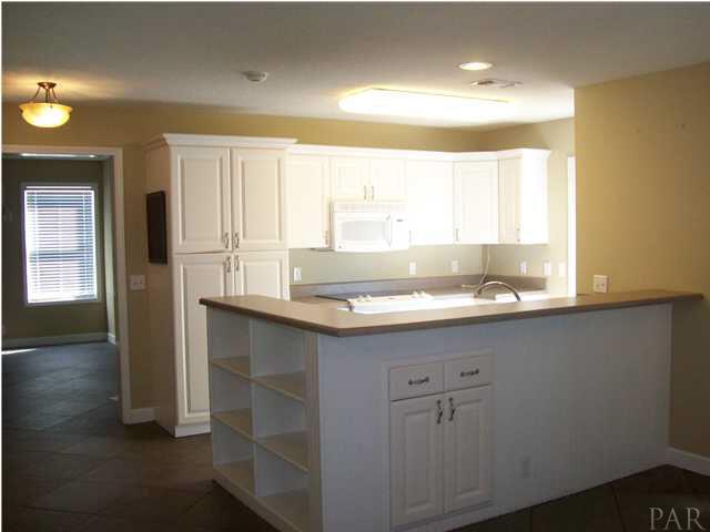 3521 Bauer Road Pensacola, FL 32506 - Photo 4 of 25 View of kitchen from living room area.