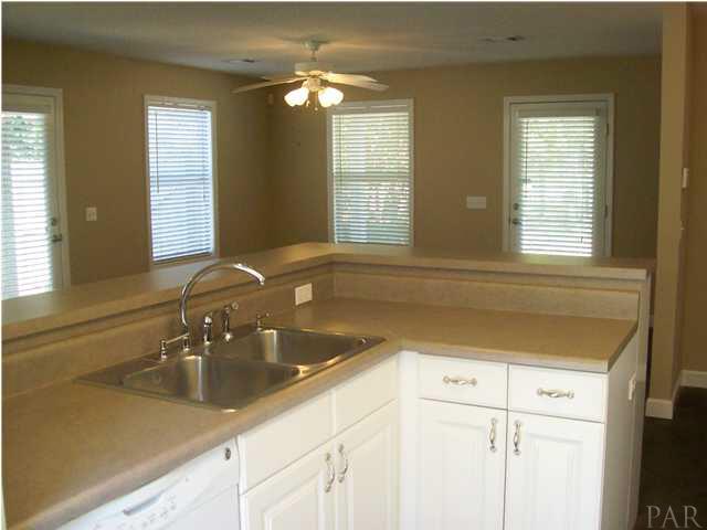 3521 Bauer Road Pensacola, FL 32506 - Photo 6 of 25 View of kitchen looking toward the front door.