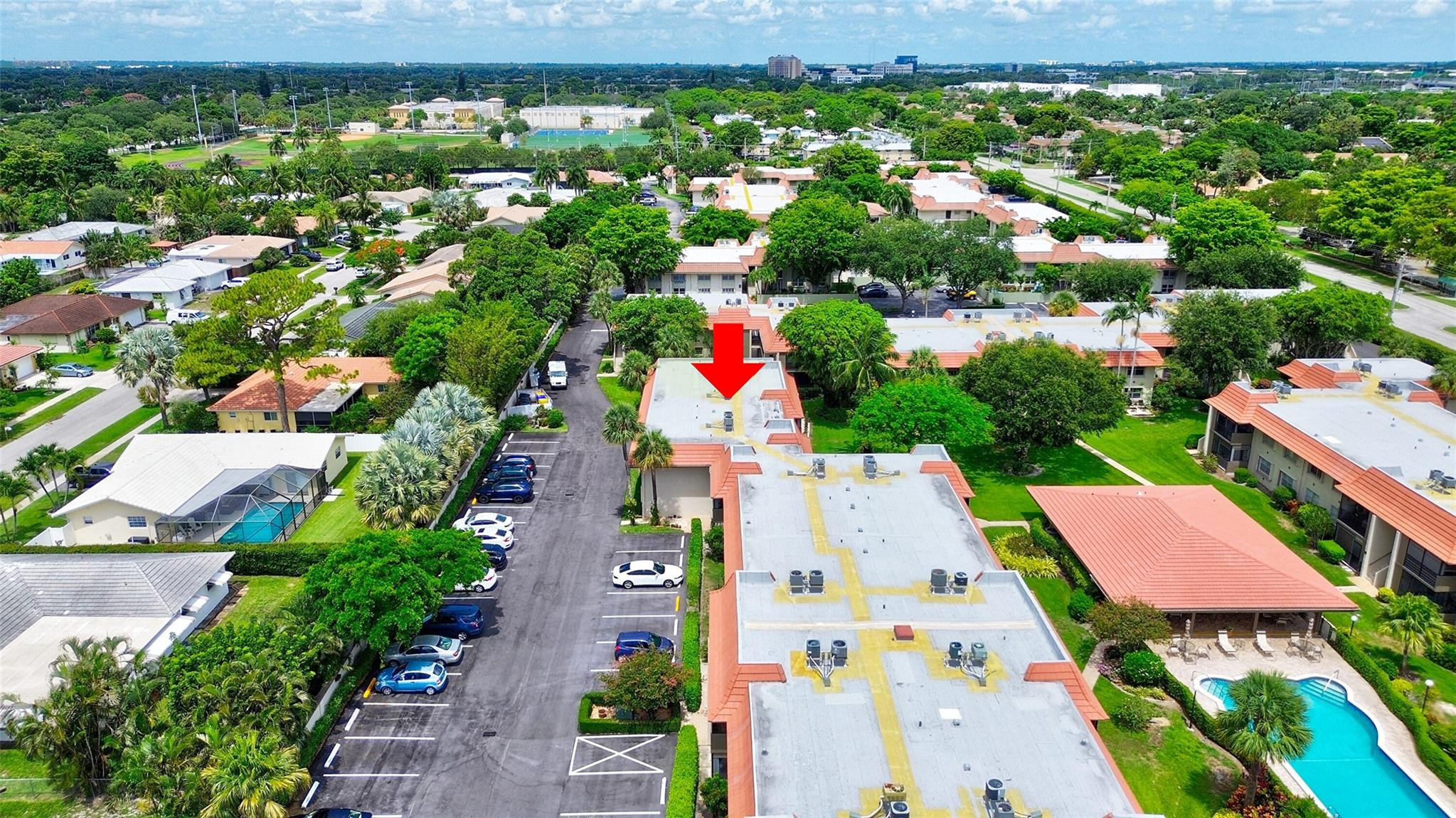 1024 Northwest 13th Street, Unit 149B Boca Raton, FL 33486 - Photo 36 of 42 an aerial view of residential houses with outdoor space and street view