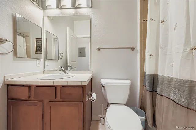 a view of a hallway with washer and dryer