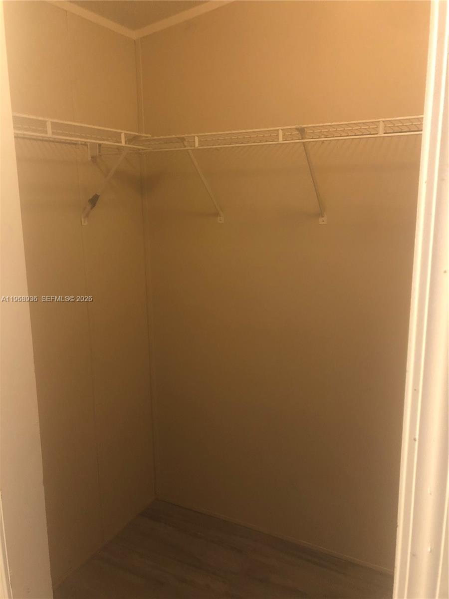 Watergate Boca Raton, FL 33428 - Photo 15 of 19 a view of a room with racks on the wall