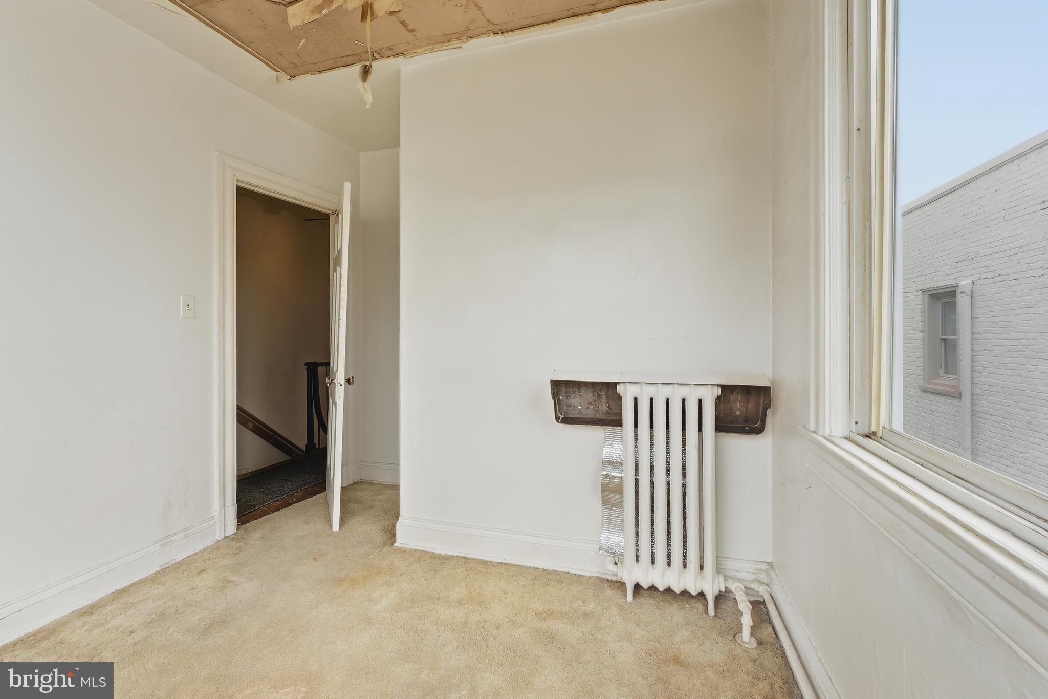 726 Somerset Place Northwest Washington, DC 20011 - Photo 16 of 28 an empty room with windows
