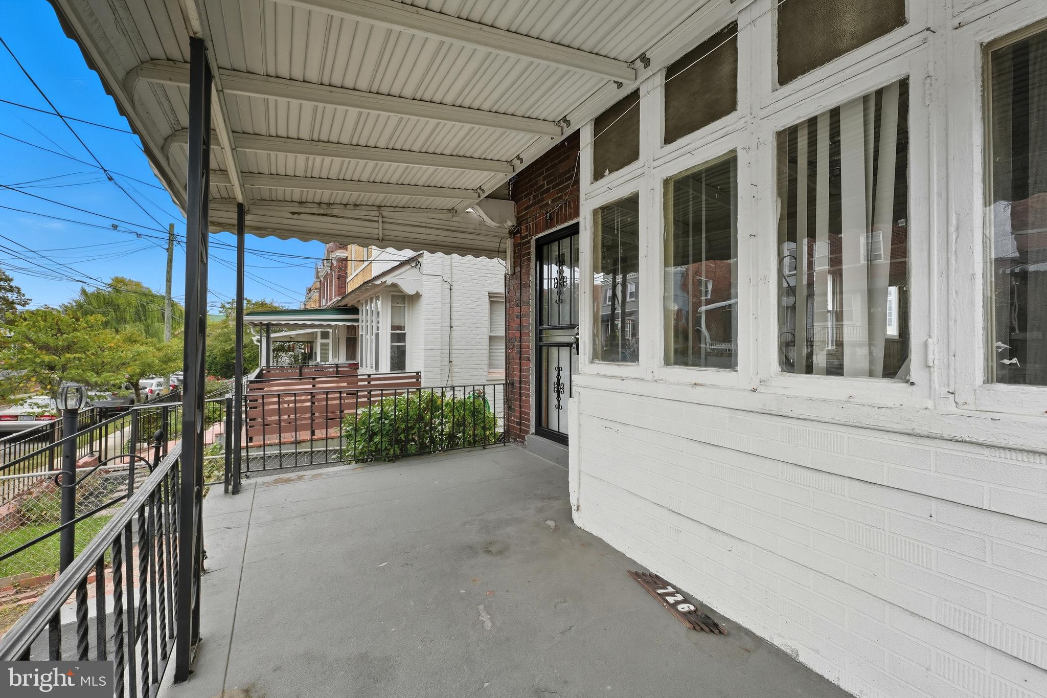 726 Somerset Place Northwest Washington, DC 20011 - Photo 2 of 28 a view of a house with backyard and porch