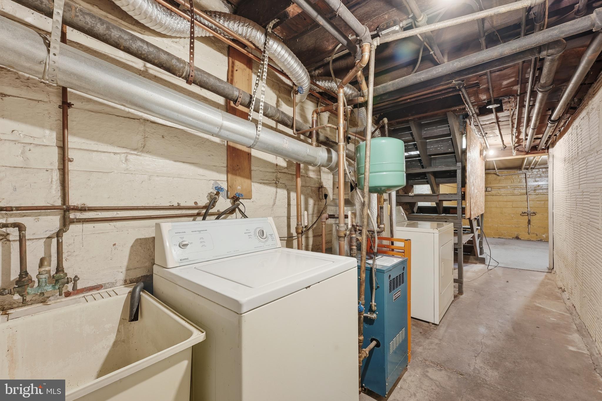 726 Somerset Place Northwest Washington, DC 20011 - Photo 26 of 28 a utility room with dryer and washer