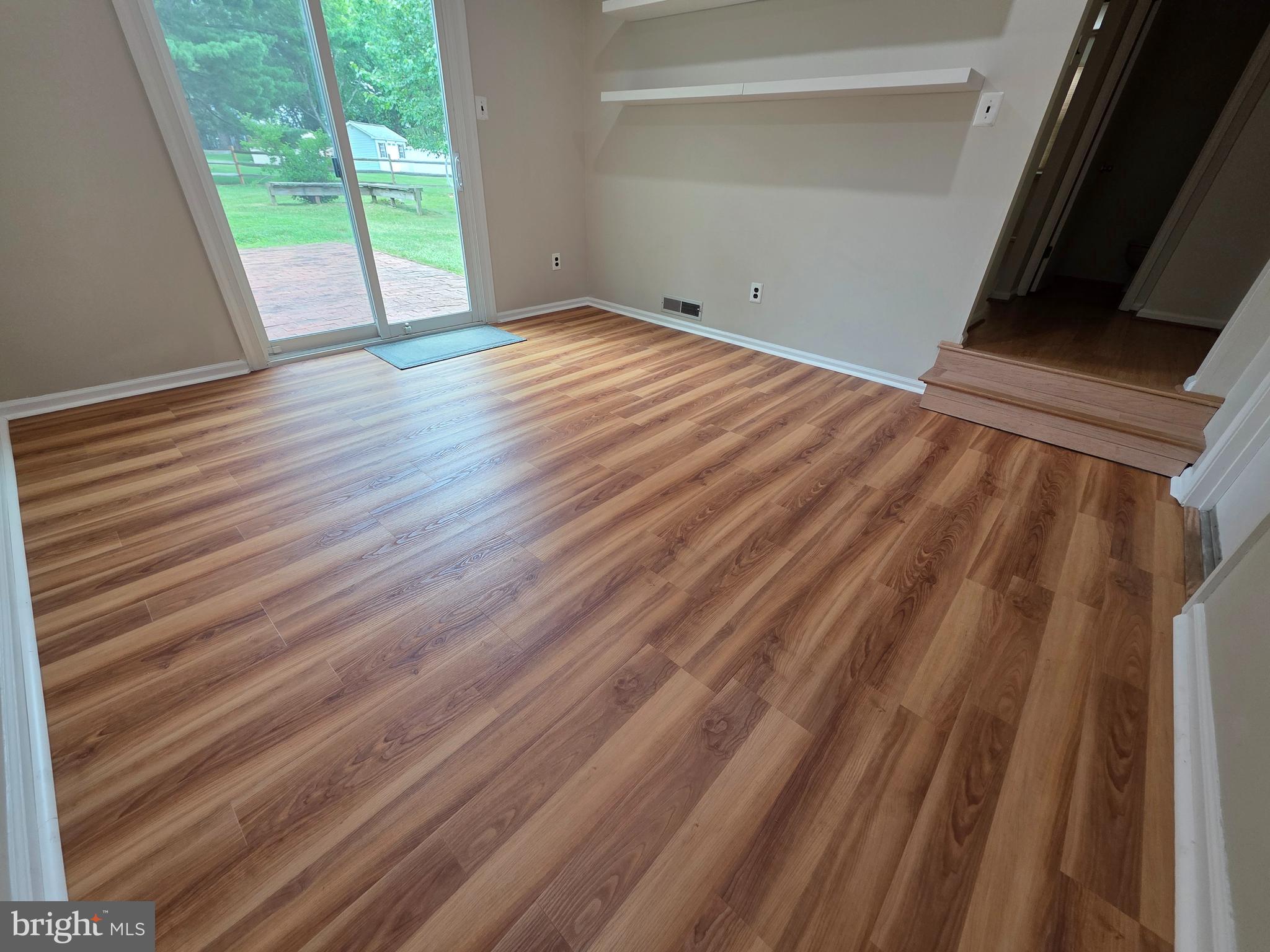 75 Dawson Road Langhorne, PA 19047 - Photo 18 of 47 a view of an empty room with wooden floor and a window