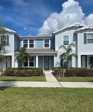 a front view of a house with yard