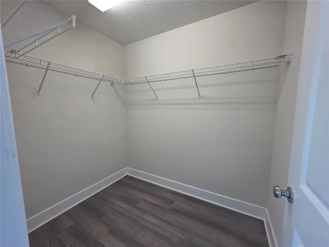 a view of a room with racks on the wall