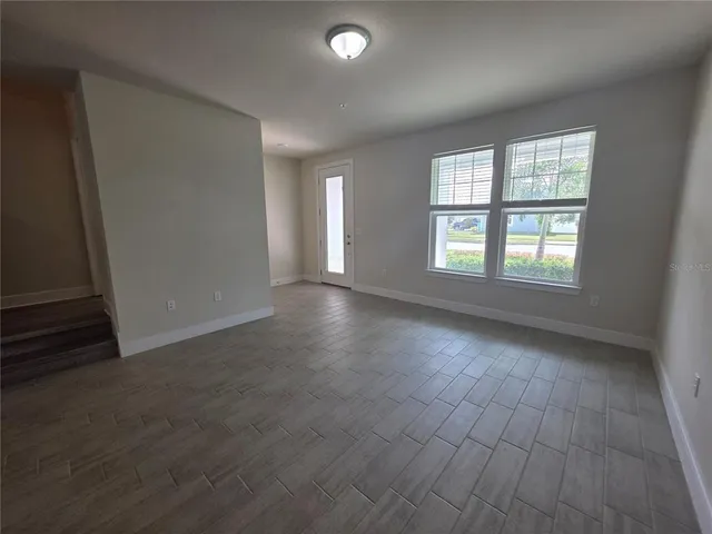 an empty room with windows
