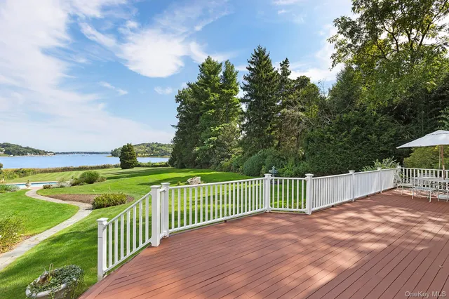 a view of a deck with a yard