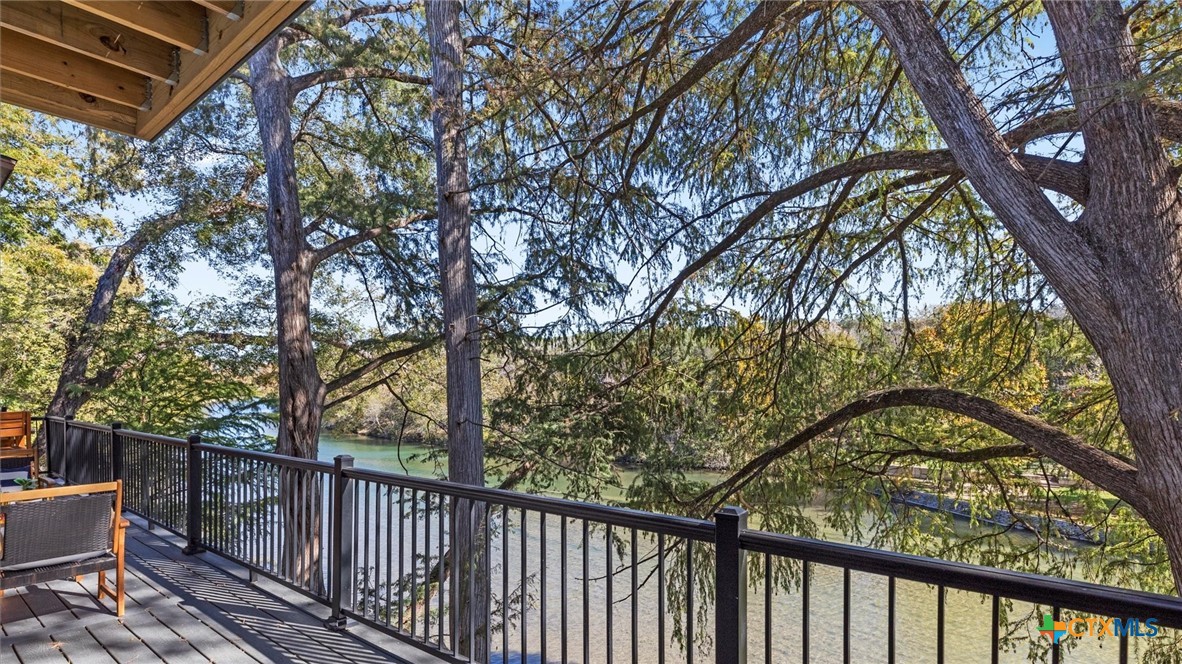 6786 River Road New Braunfels, TX 78132 - Photo 15 of 38 a view of a balcony with trees