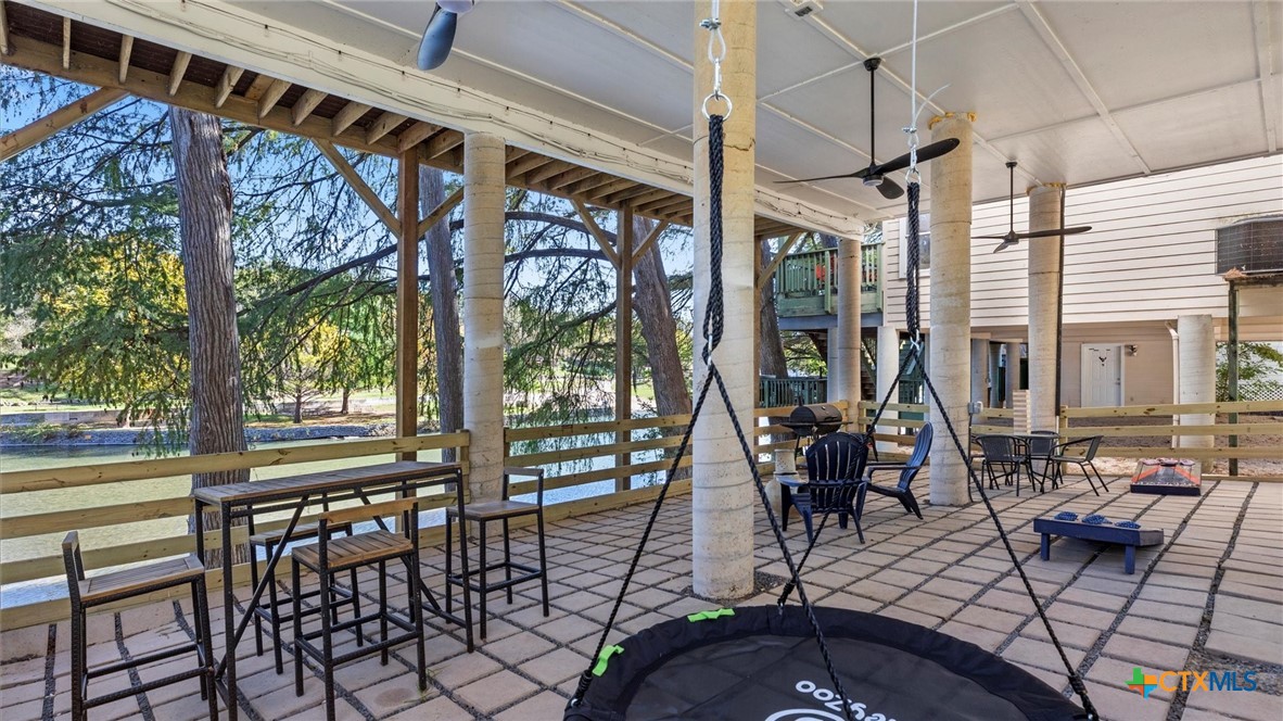 6786 River Road New Braunfels, TX 78132 - Photo 27 of 38 a view of an outdoor space with seating