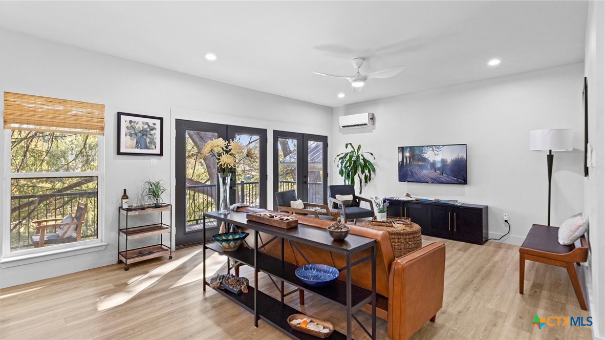 6786 River Road New Braunfels, TX 78132 - Photo 4 of 38 a living room with furniture and a window