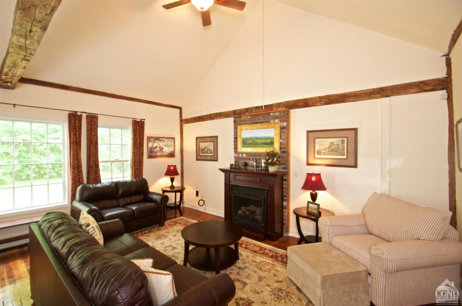 270 County 17 Valatie, NY 12184 - Photo 5 of 13 a living room with furniture and a flat screen tv