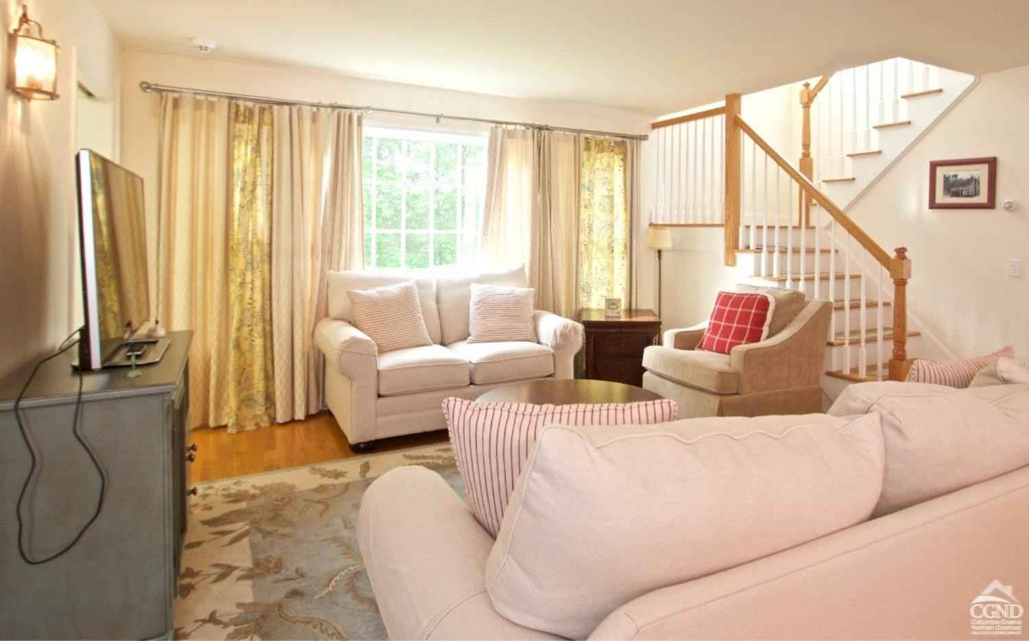 270 County 17 Valatie, NY 12184 - Photo 7 of 13 a living room with furniture and a window